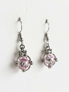 Silver and pink fairy dangly earrings